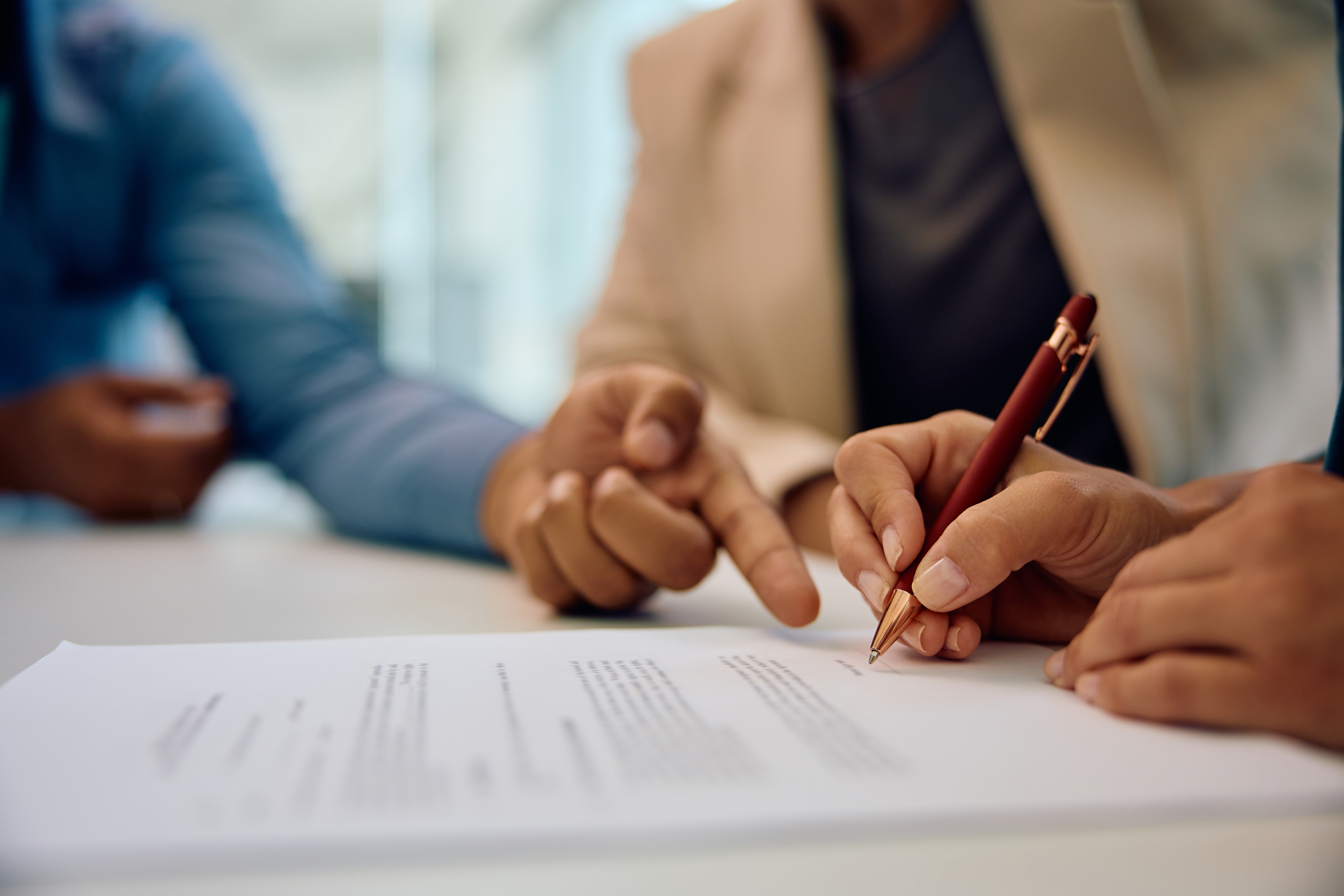 Bank manager closing deal with a couple
