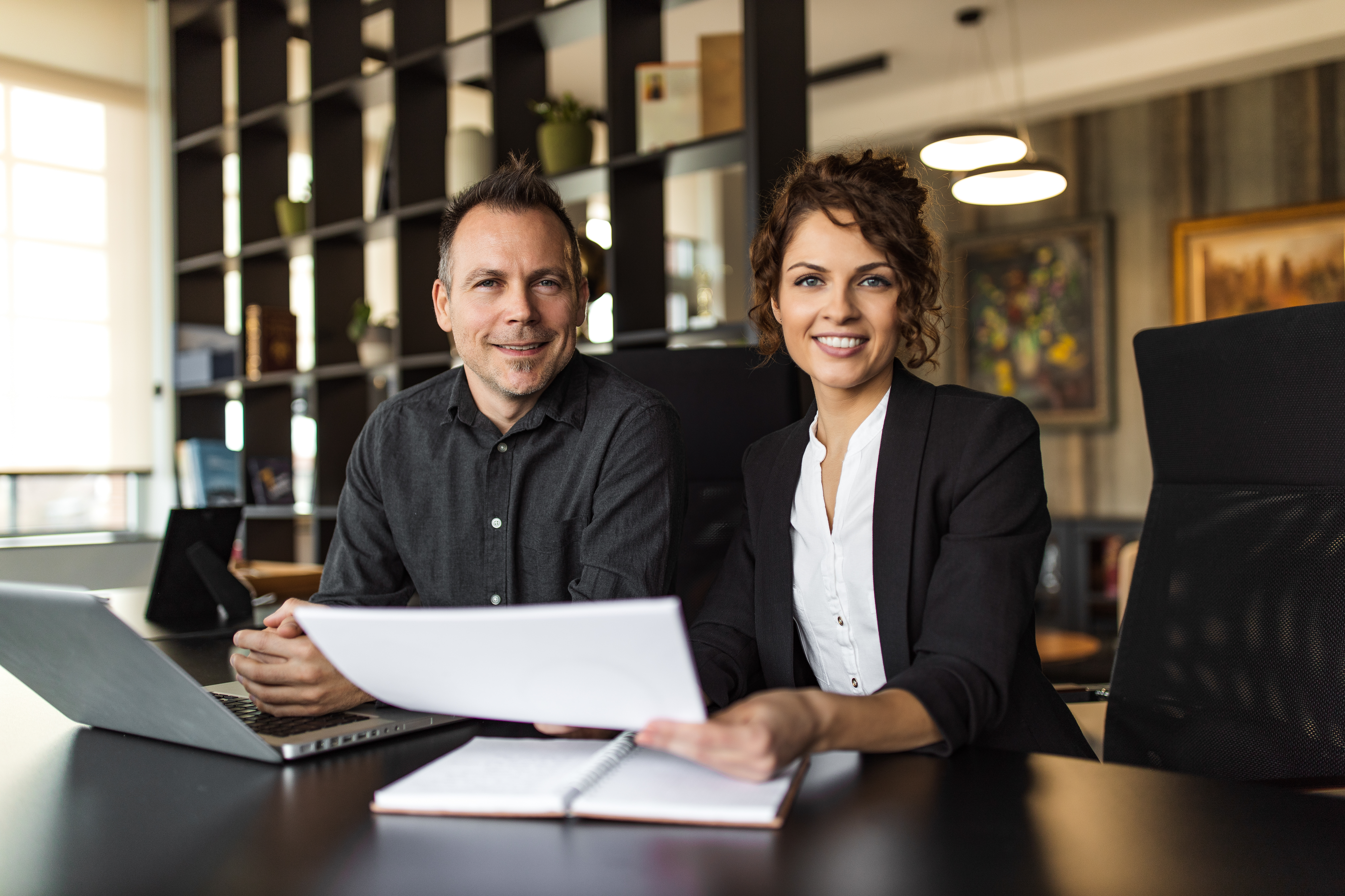 Business leaders reviewing talent together