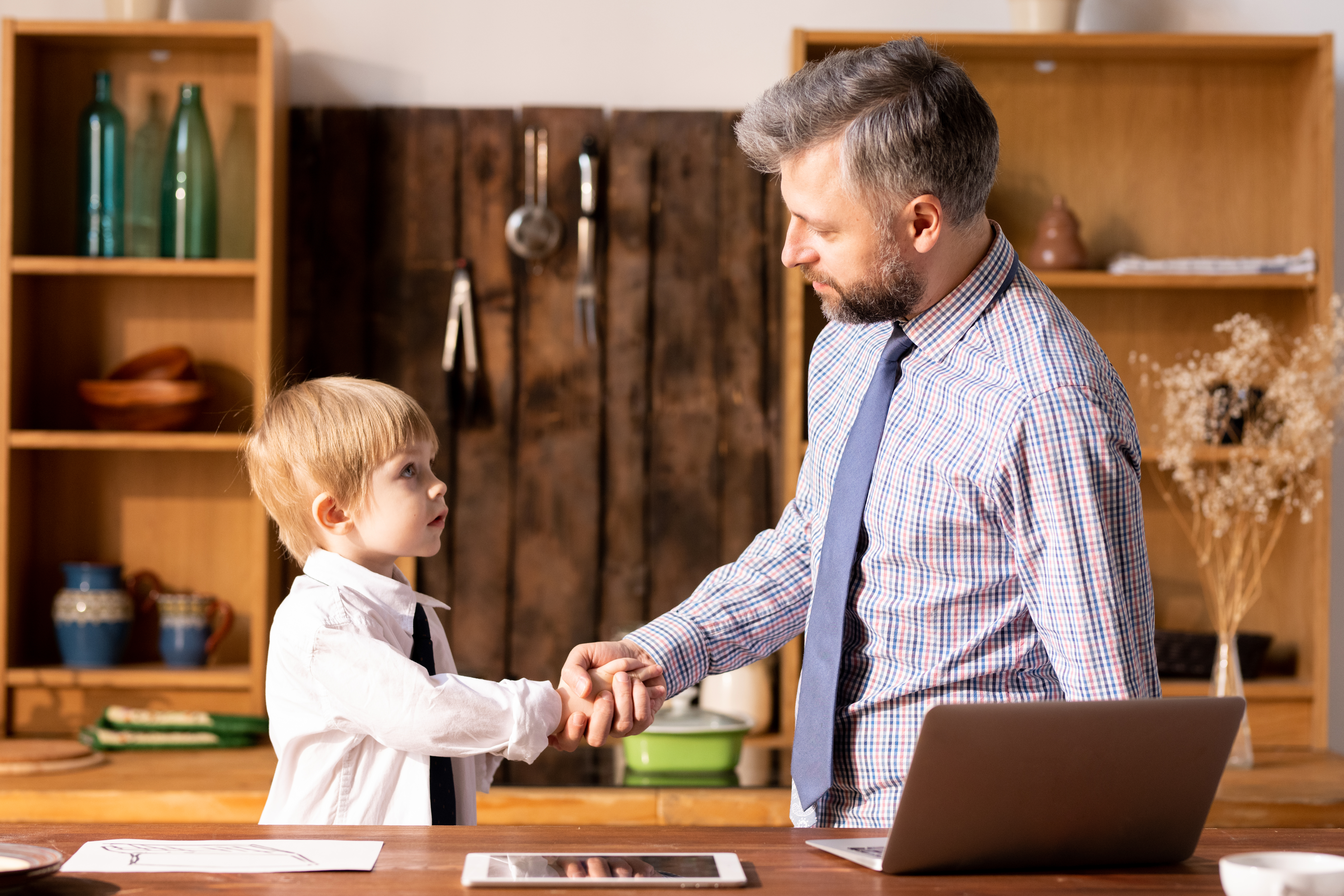 Father and son handshake