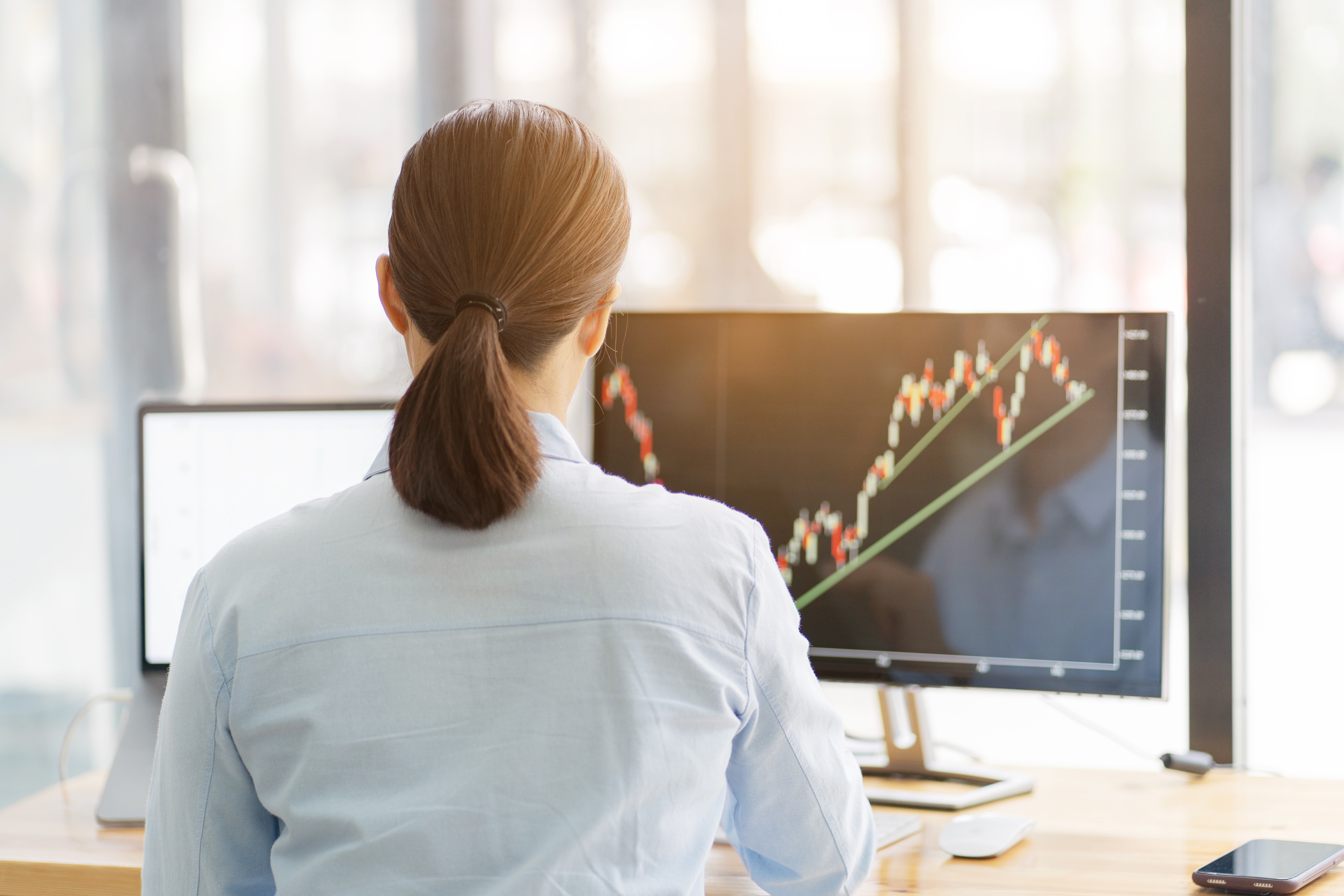 Investor calculating profits