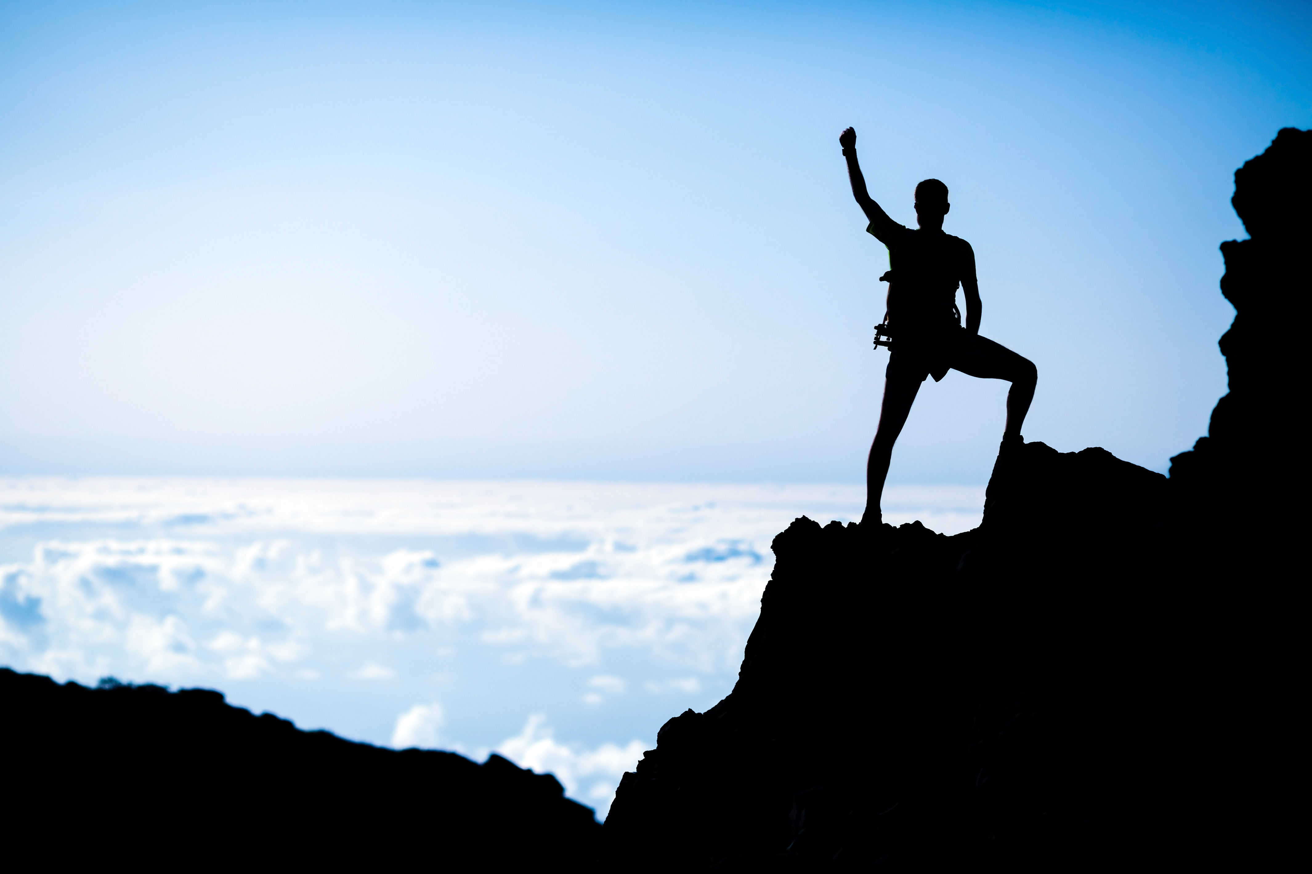 Silhouette on mountain summit