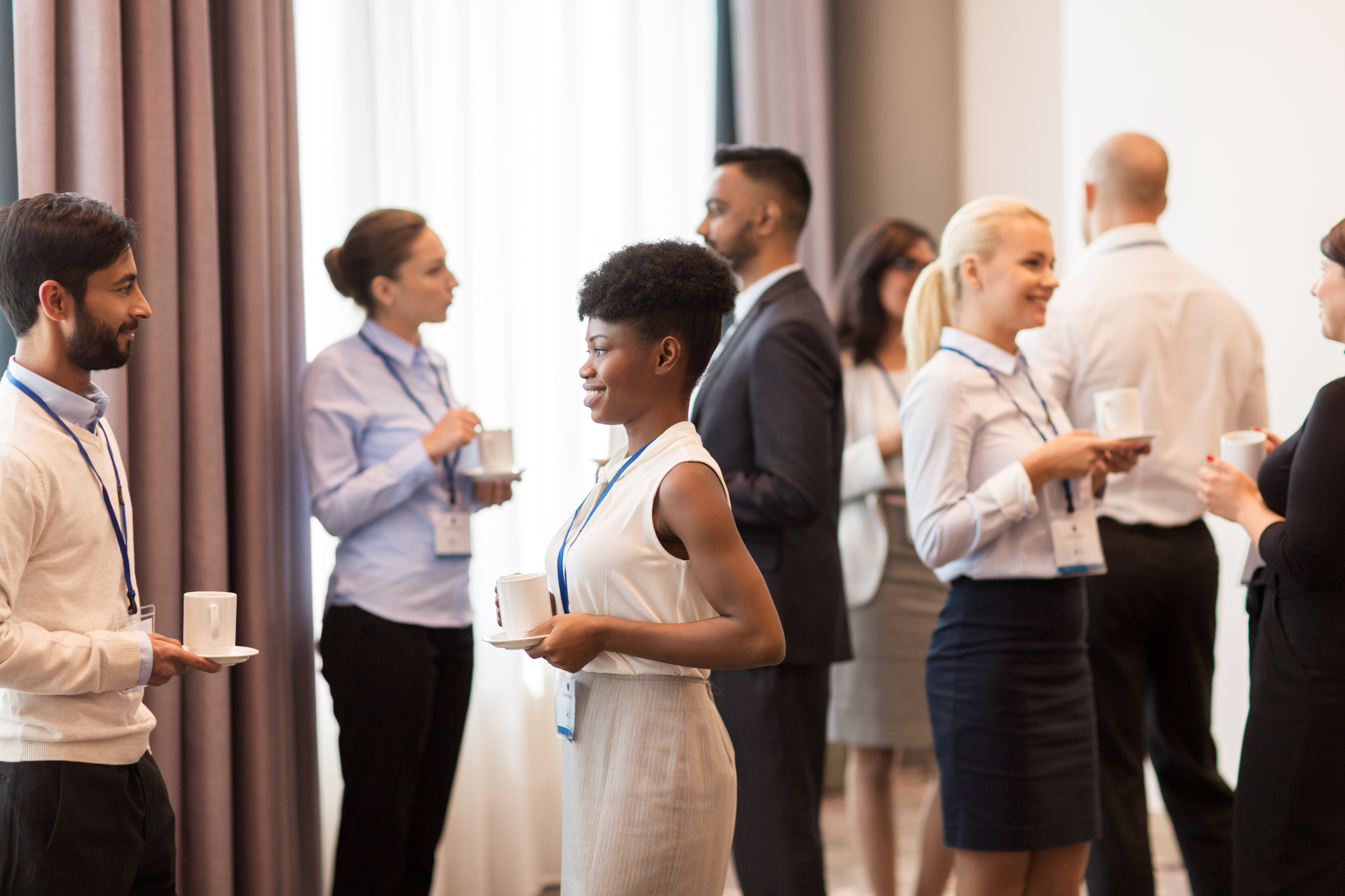 Business professionals networking at a corporate event